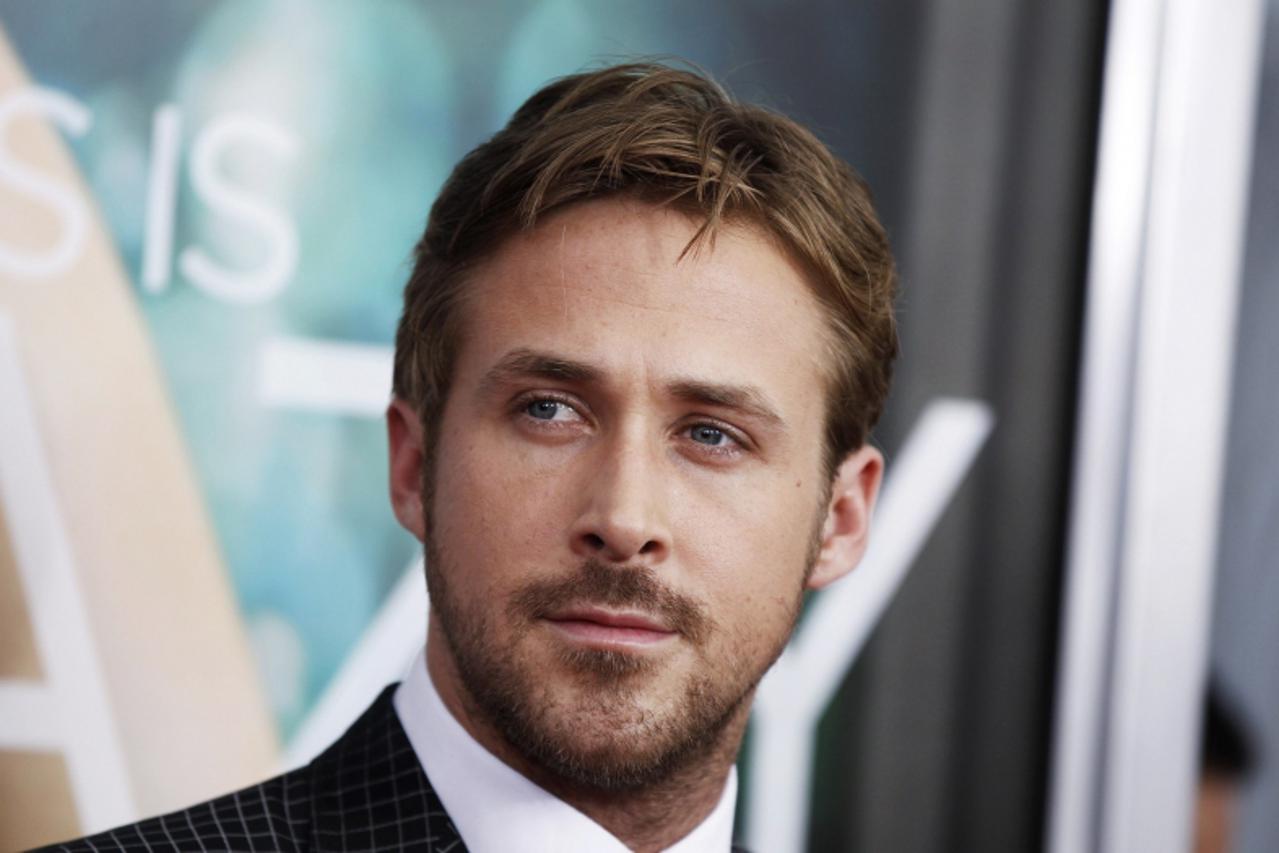 'Cast member Ryan Gosling arrives for the premiere of his film \'Crazy, Stupid, Love\' in New York July 19, 2011.   REUTERS/Lucas Jackson (UNITED STATES - Tags: ENTERTAINMENT HEADSHOT)'