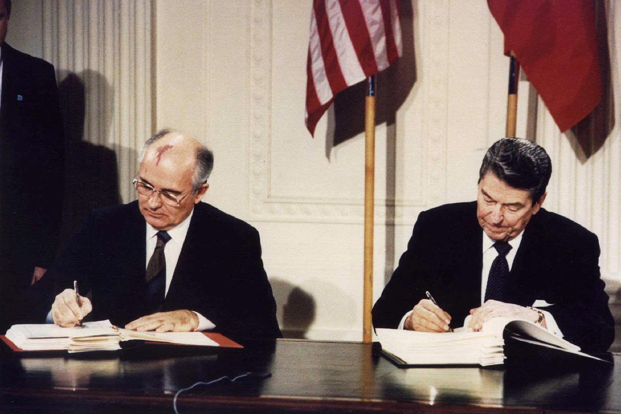 FILE PHOTO: Ronald Reagan and Mikhail Gorbachev sign the Intermediate-Range Nuclear Forces (INF) treaty in Washington