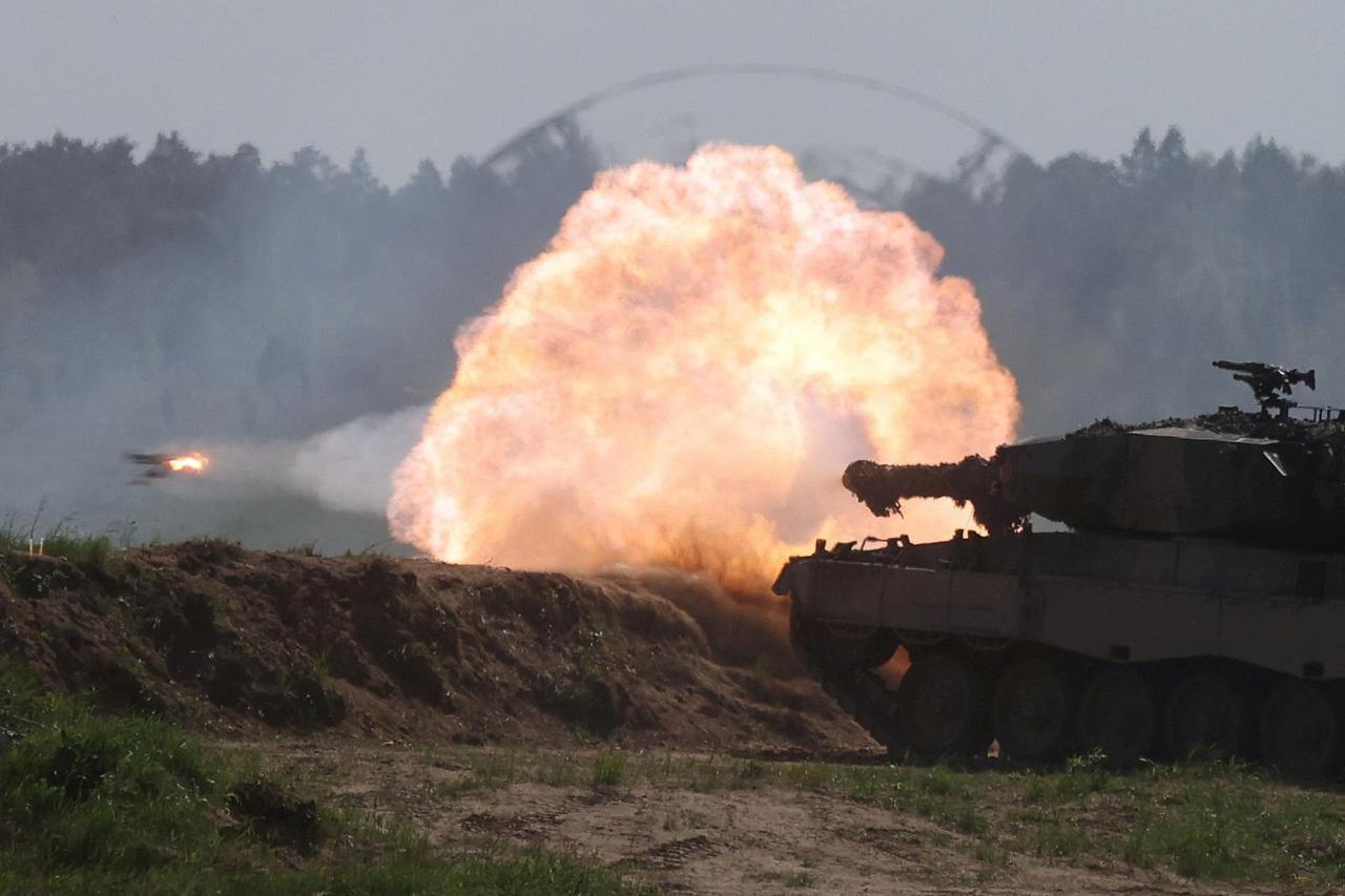 FILE PHOTO: Polish Leopard 2PL tank fires during Defender Europe 2022 military exercise at the military range in Bemowo Piskie