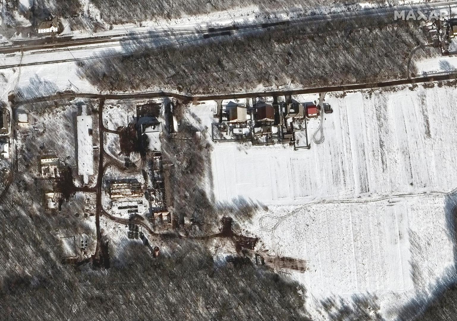 A satellite image shows deployment in an industrial area, near Belgorod, Russia February 20, 2022. Maxar Technologies/Handout via REUTERS ATTENTION EDITORS - THIS IMAGE HAS BEEN SUPPLIED BY A THIRD PARTY. NO RESALES. NO ARCHIVES. MANDATORY CREDIT. DO NOT OBSCURE LOGO Photo: MAXAR TECHNOLOGIES/REUTERS