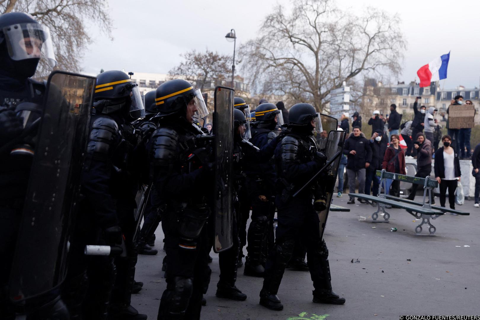 French riot police stand in position during clashes at a demonstration as part of the tenth day of nationwide strikes and protests against French government's pension reform, in Paris, France, March 28, 2023. REUTERS/Gonzalo Fuentes Photo: GONZALO FUENTES/REUTERS