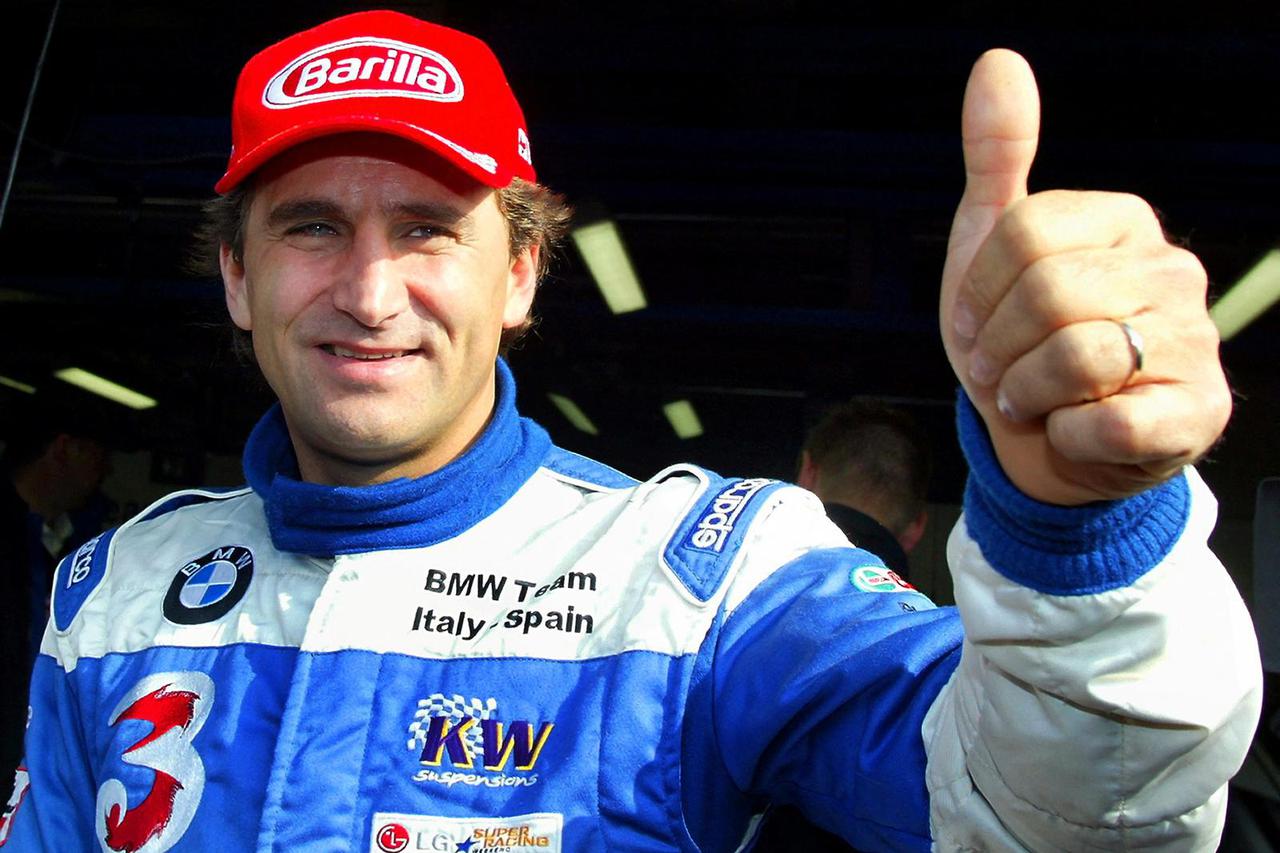 FILE PHOTO: ITALIAN DRIVER ZANARDI GIVES THUMBS UP BEFORE LG SUPER RACING CAR EVENTIN MONZA.