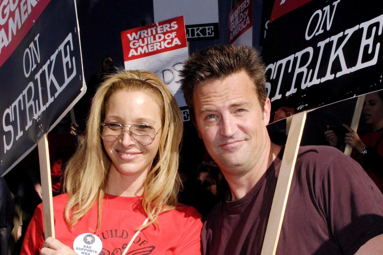 FILE PHOTO: "Friends" cast members Kudrow and Perry participate in a rally outside Universal Studios in Los Angeles
