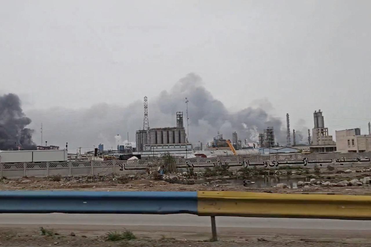 Smoke rises after strikes on the Mahshahr Petrochemical Zone in Bandar Mahshahr County