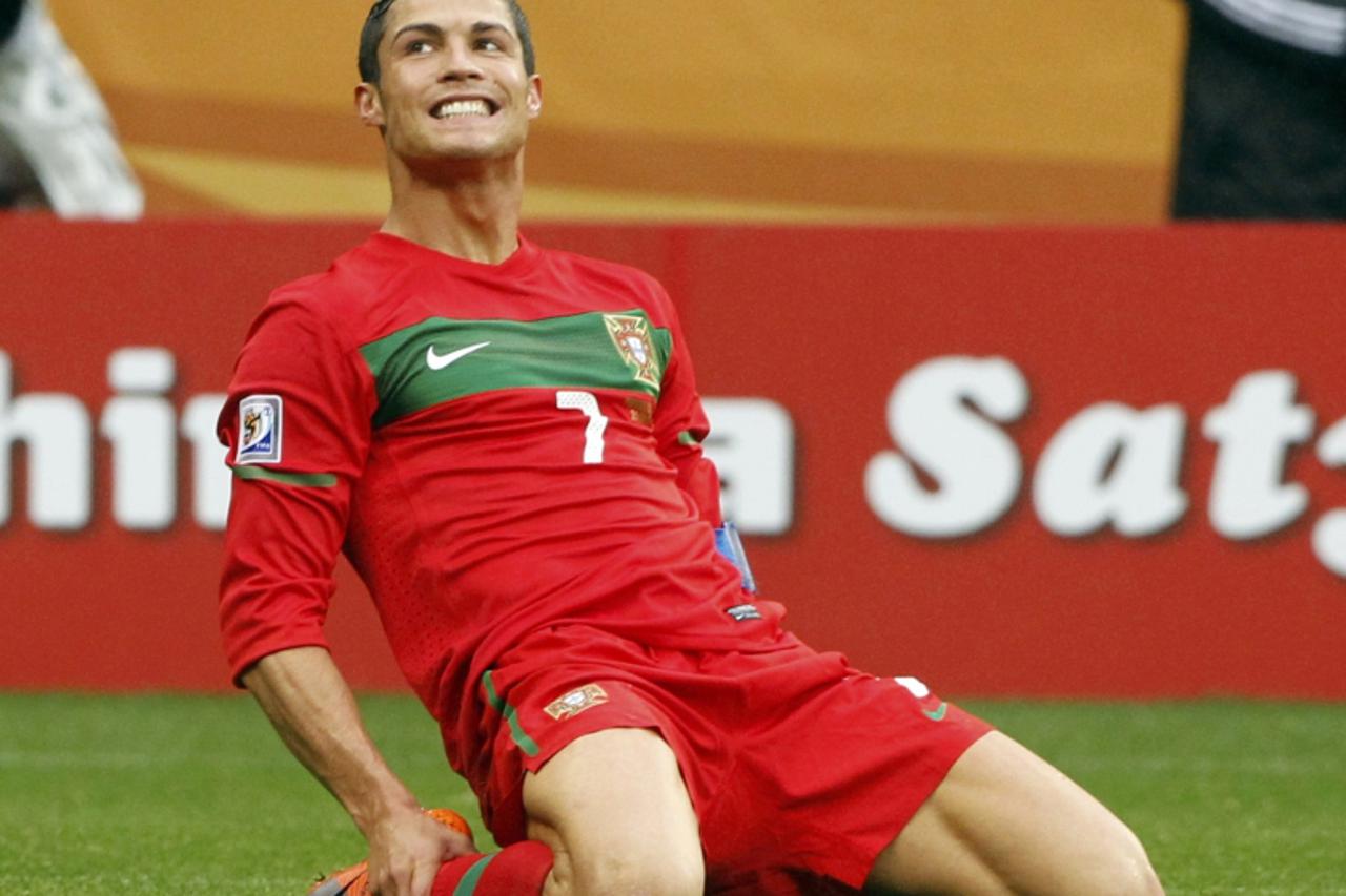 'Portugal\'s Cristiano Ronaldo reacts during the 2010 World Cup group G soccer match against North Korea at Green Point stadium in Cape Town June 21, 2010.   REUTERS/Mike Hutchings (SOUTH AFRICA  - Ta