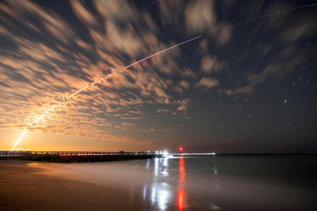 FILE PHOTO: Starlink satellites launch from Cape Canaveral