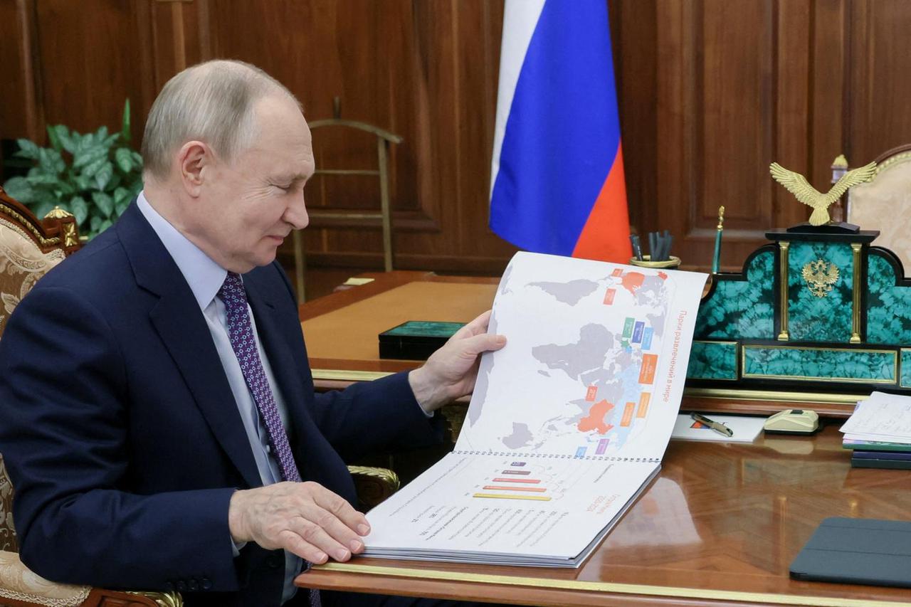 Russian President Putin meets with businessman Mutsoev in Moscow