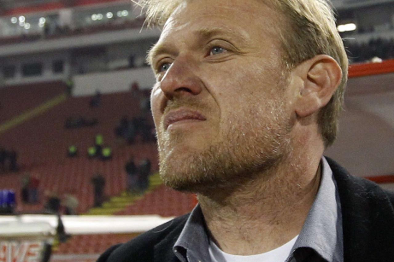 'Robert Prosinecki arrives at his first official match as a coach of Red Star Belgrade against F.C. Smederevo in Belgrade March 5, 2011. Prosinecki played for Red Star in 1991 when the most popular Se