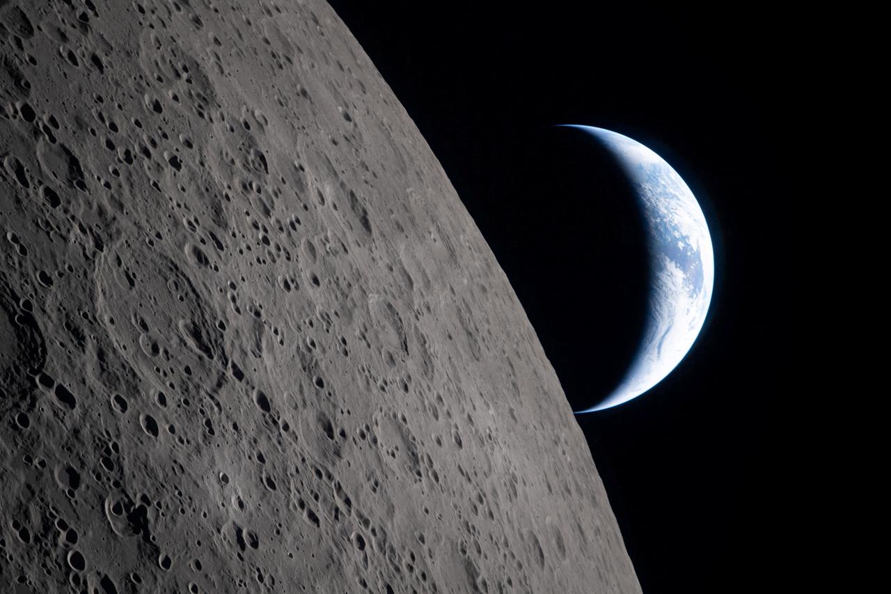 A view of Earth, partially hidden by the Moon