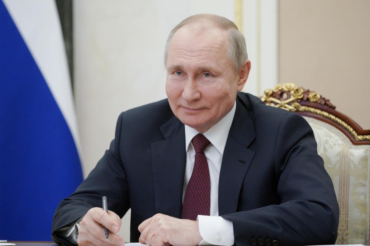 Russian President Vladimir Putin takes part in a video conference in Moscow