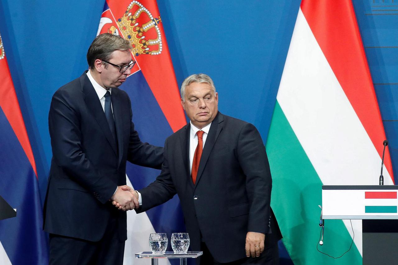 Hungarian PM Orban, Austrian Chancellor Nehammer and Serbian President Vucic attend a news conference in Budapest