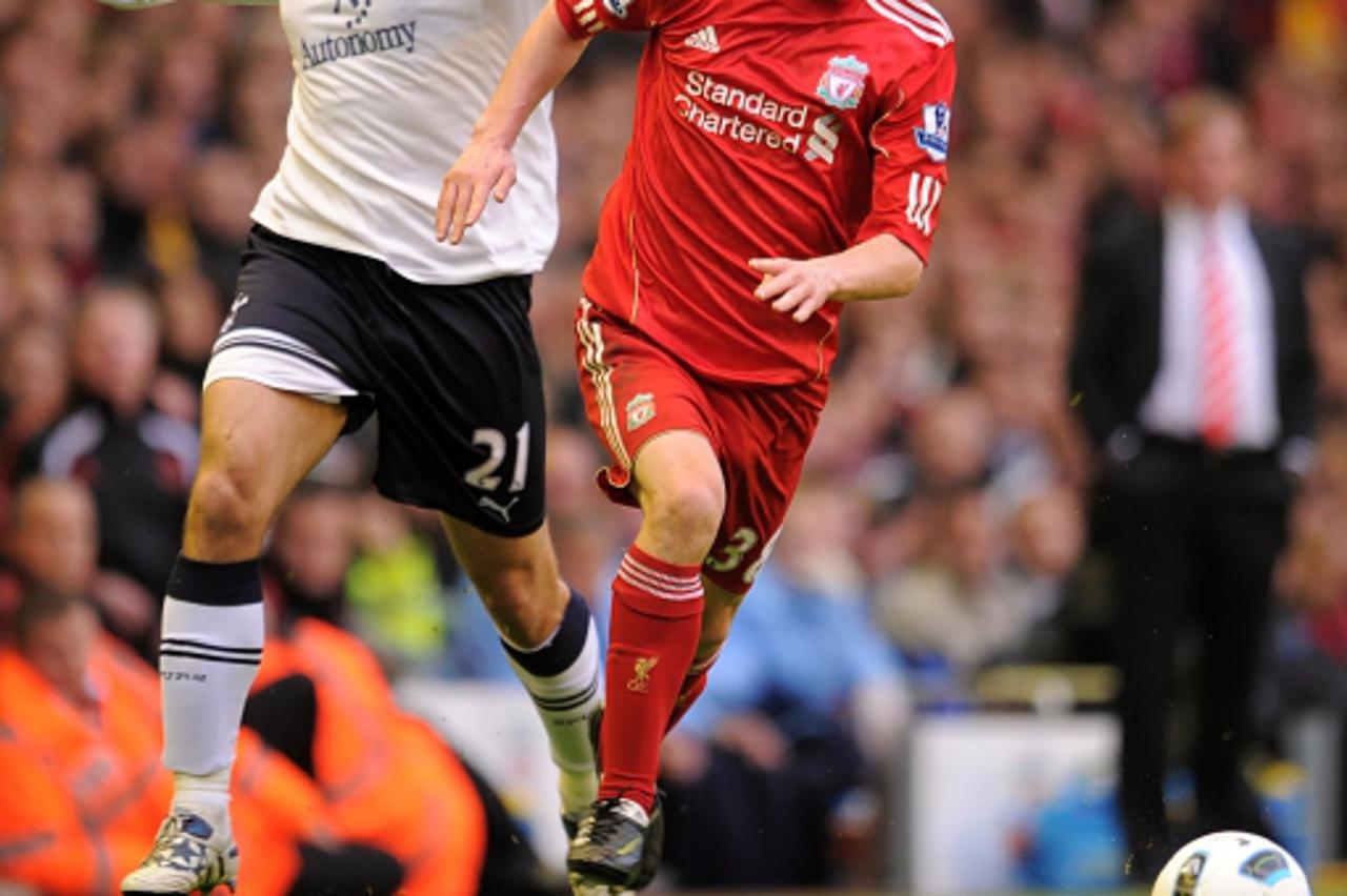 \'Tottenham Hotspur\'s Niko Kranjcar (left) and Liverpool\'s John Flanagan (right) battle for the ball. Photo: Press Association/Pixsell\'