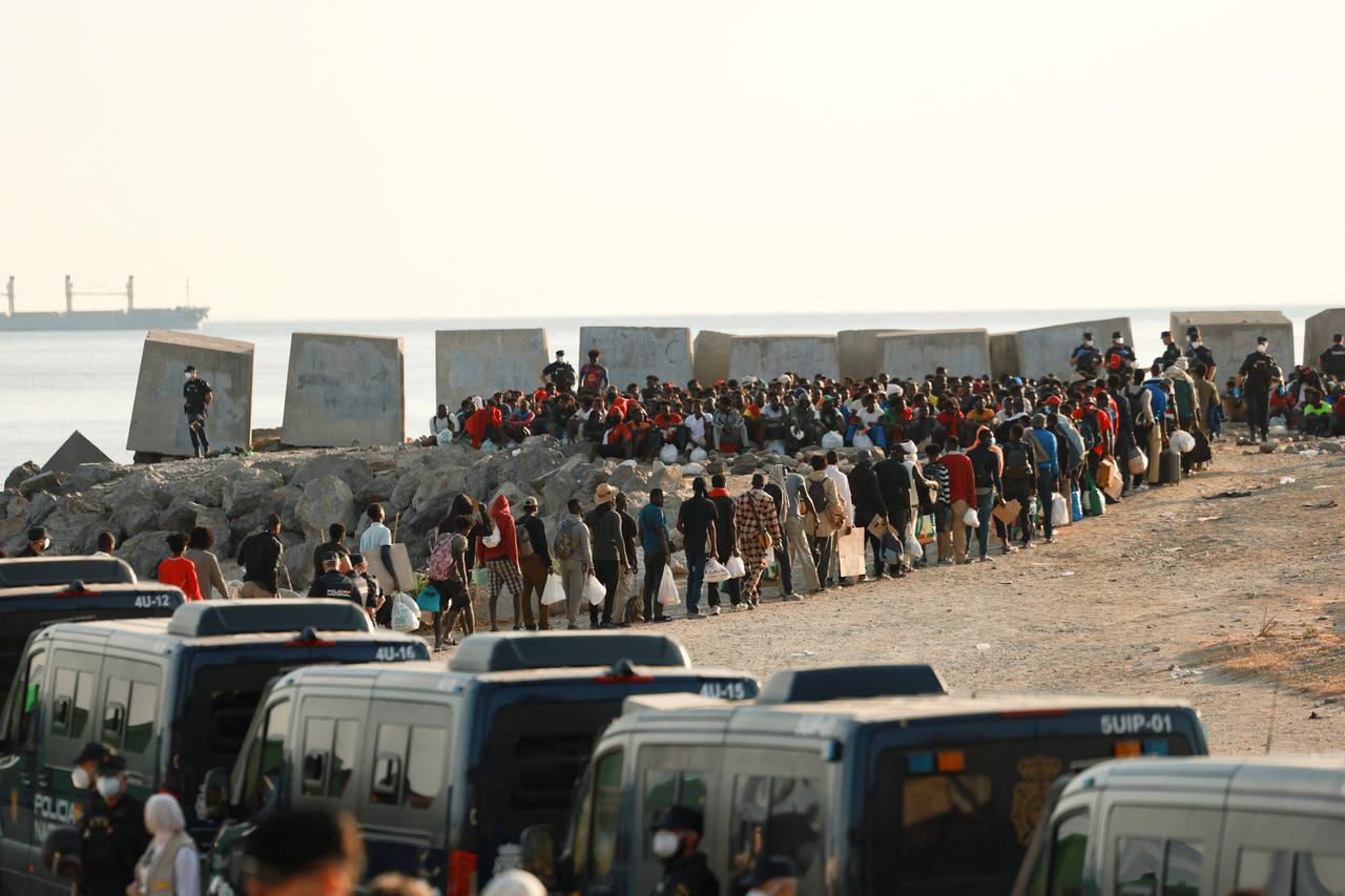 Spanish police evicts migrants from Ceuta beach camp, moves them to shelters