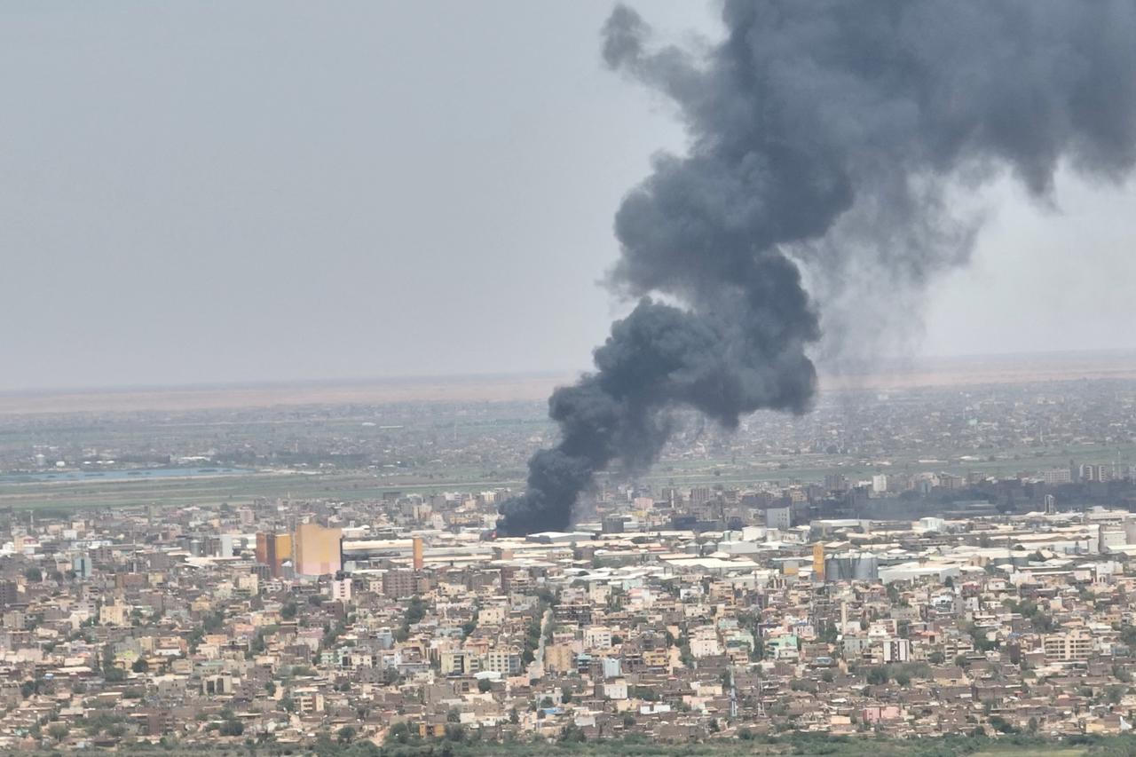 Drone footage shows dense smoke rising from fires near capital Khartoum