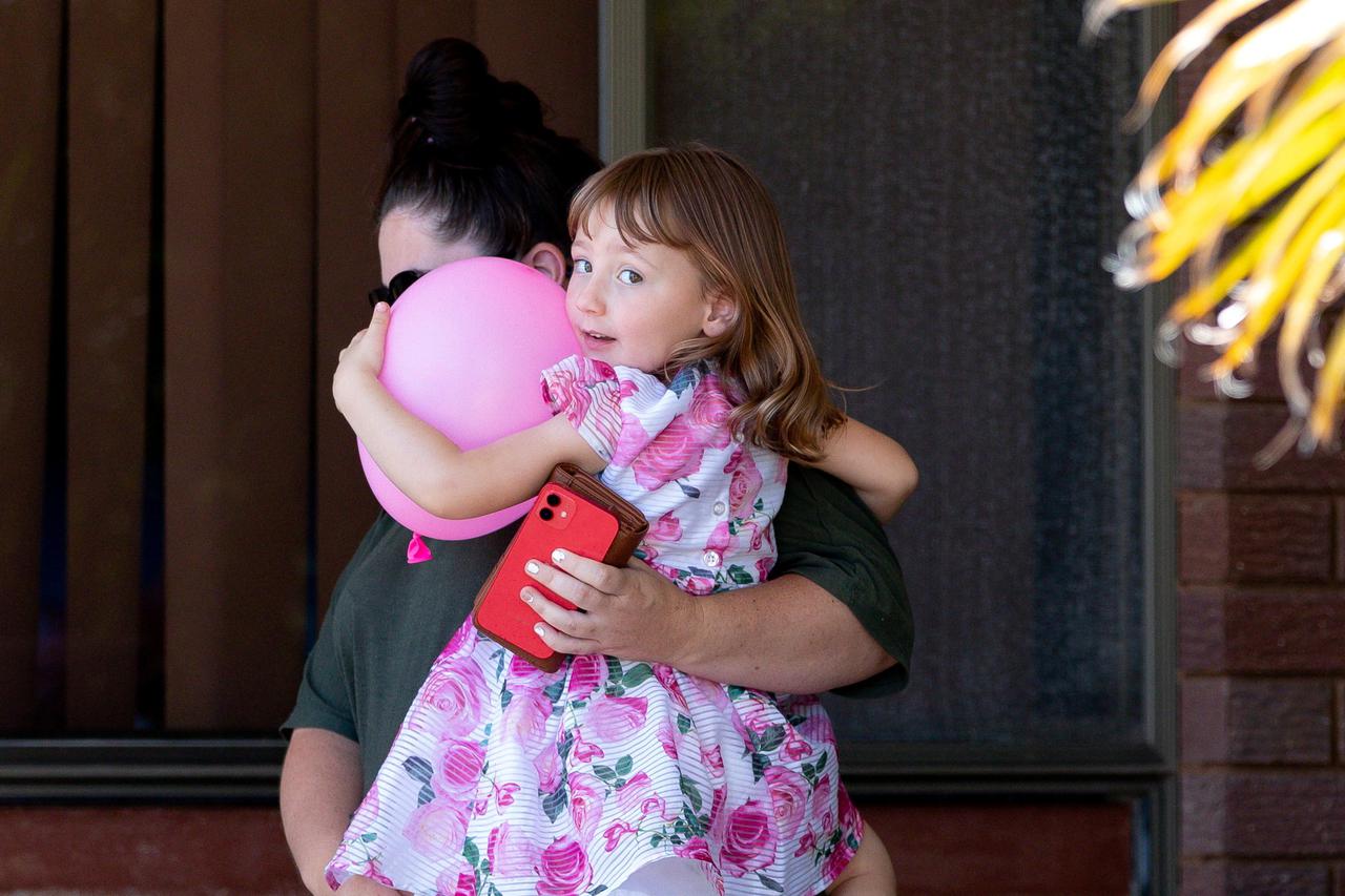Cleo Smith and her mother leave a house where the girl spent her first night after being rescued in Carnarvon