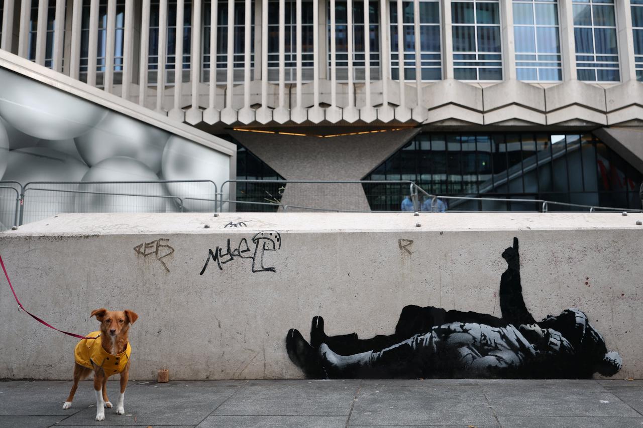 A new mural reported to be by anonymous artist Banksy, in Tottenham Court Road, London