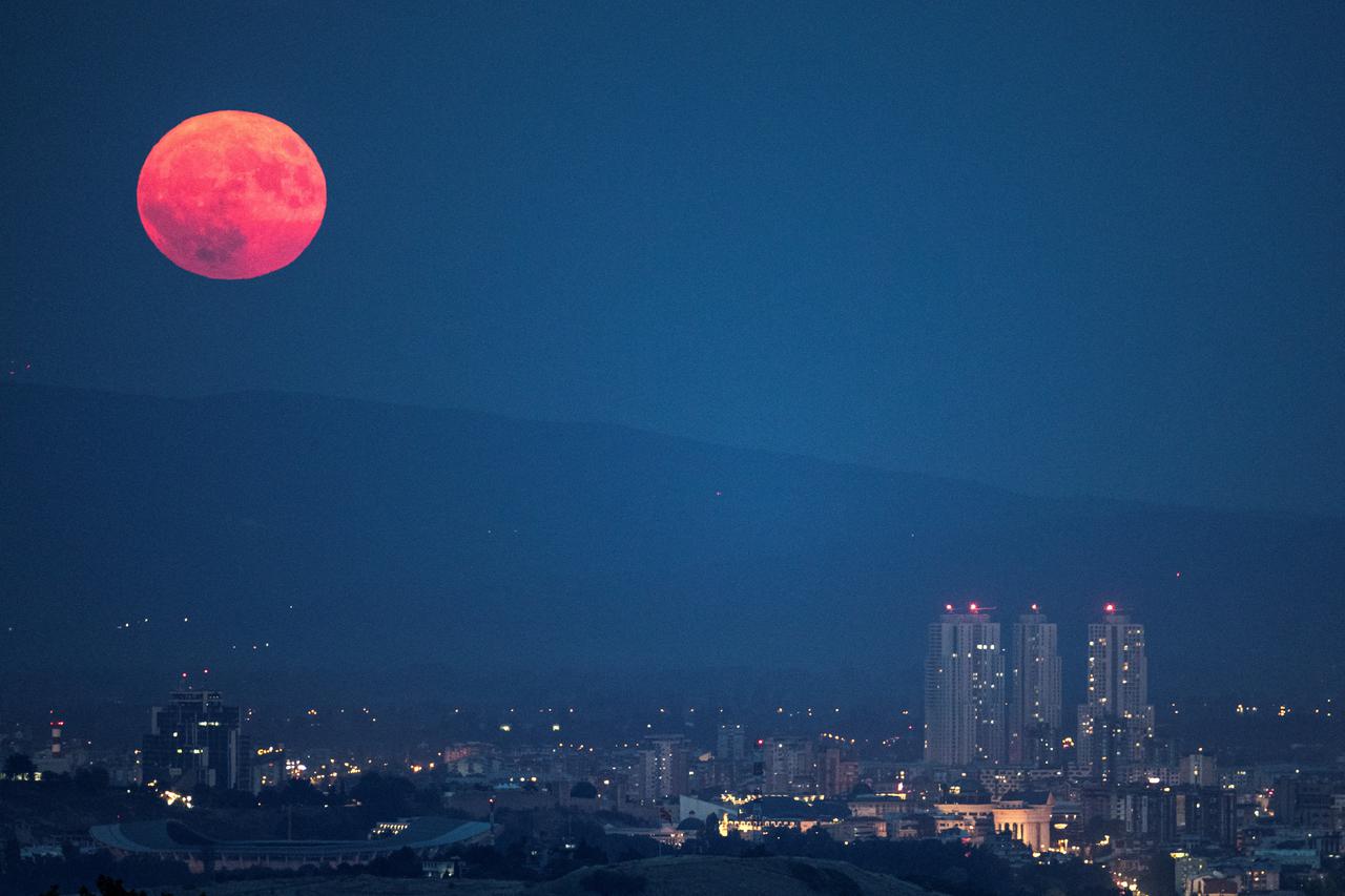 A full moon known as the Sturgeon Moon rises over Skopje