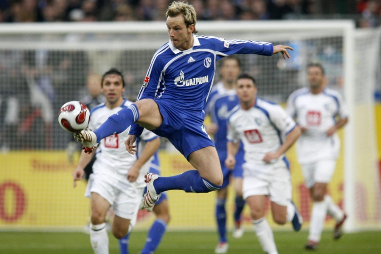 'Schalke 04\'s Ivan Rakitic jumps for a ball during the German Bundesliga soccer match against Bochum in Gelsenkirchen December 1, 2007.   REUTERS/Ina Fassbender (GERMANY).  ONLINE CLIENTS MAY USE UP 