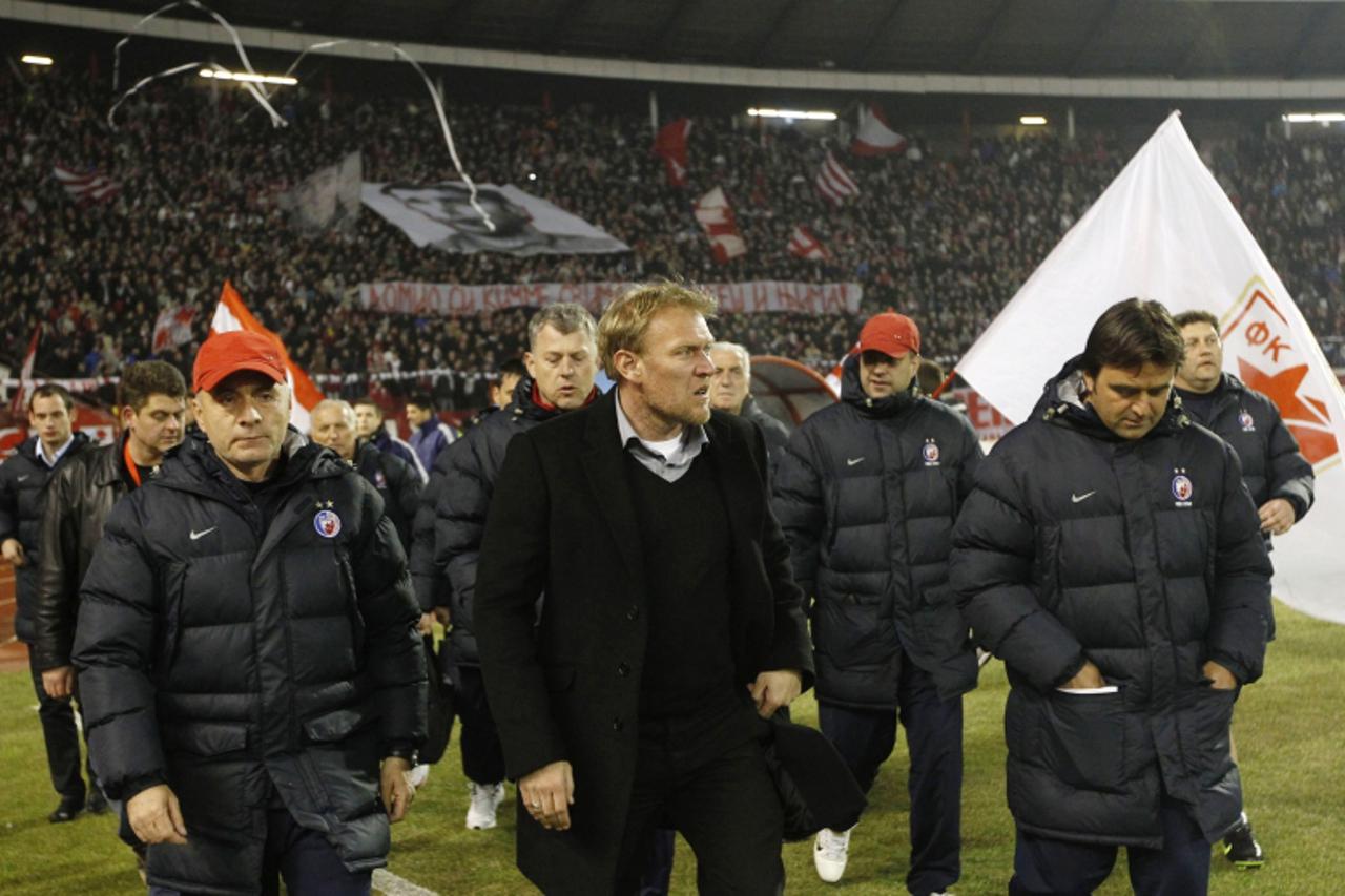 'Robert Prosinecki arrives at his first official match as a coach of Red Star Belgrade against F.C. Smederevo in Belgrade March 5, 2011. Prosinecki played for Red Star in 1991 when the most popular Se
