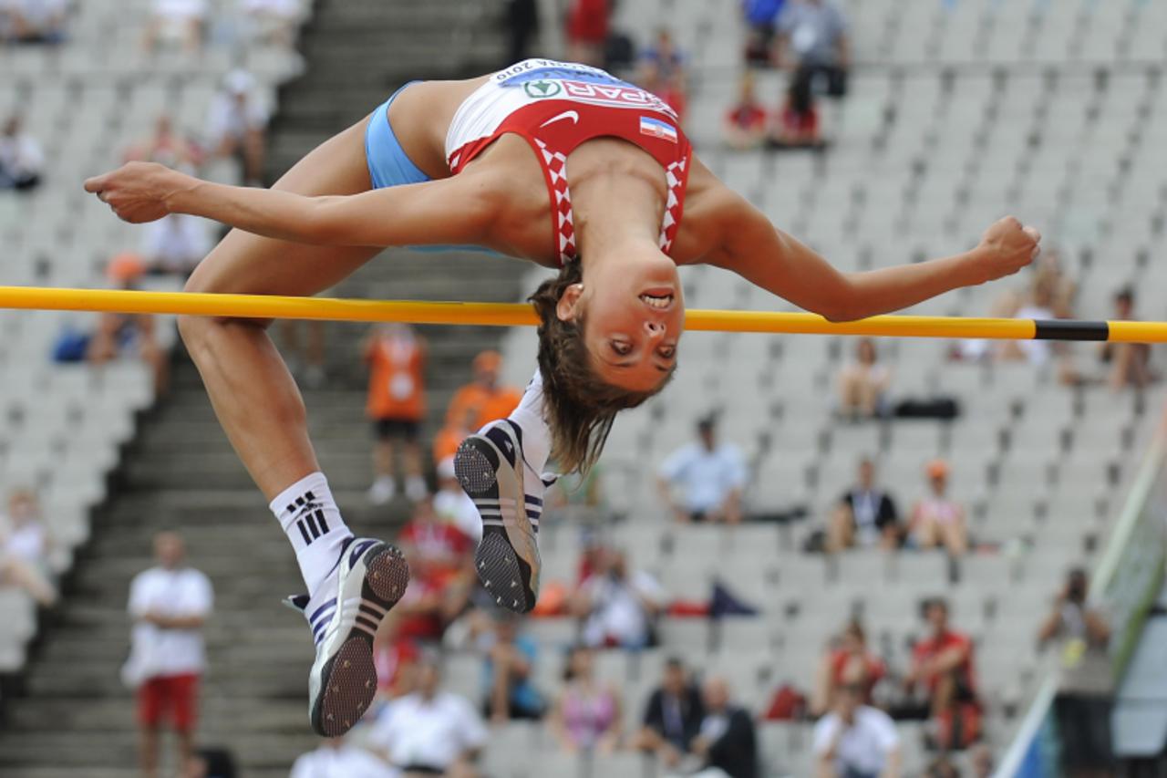 'Croatia\'s Blanka Vlasic competes during the women\'s high jump qualifications at the 2010 European Athletics Championships at the Olympic Stadium in Barcelona on July 30, 2010. AFP PHOTO / PIERRE-PH