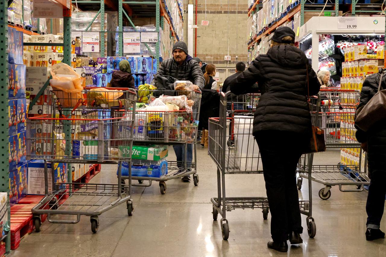FILE PHOTO: Shoppers at a Costco store in New York