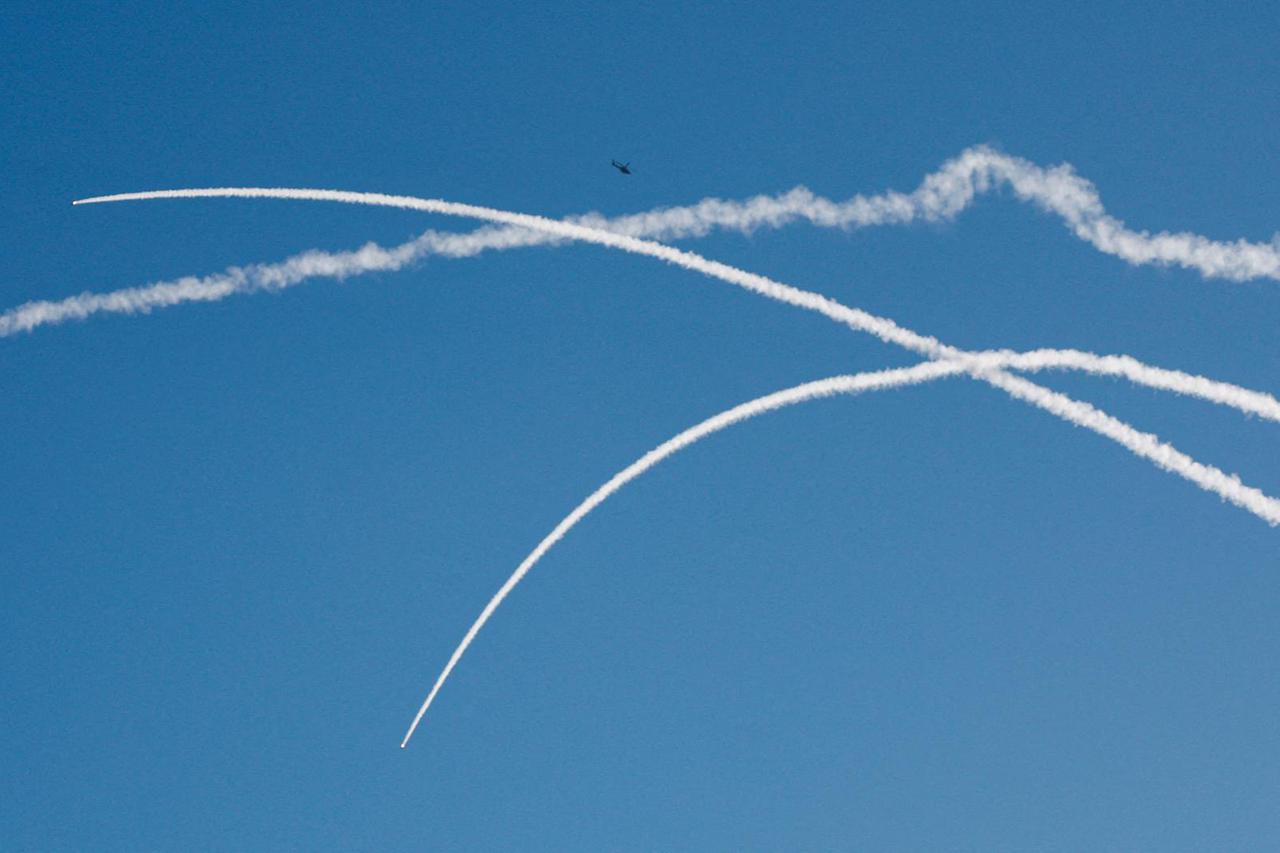 FILE PHOTO: Israel's Iron Dome anti-missile system operates for interceptions as rockets are launched from Lebanon towards Israel, as seen from near Ein Ya'akov