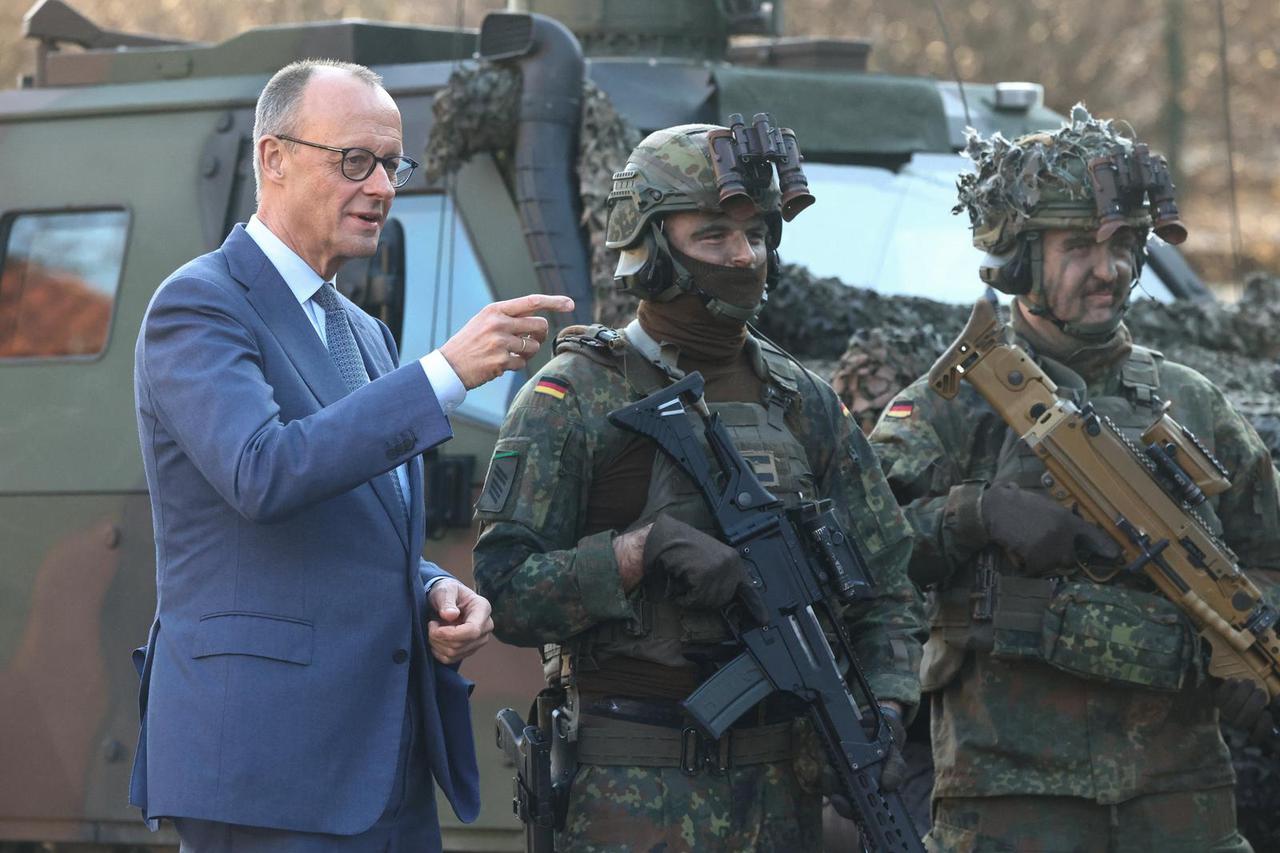 German Chancellor Merz presents the Chancellor's Ribbon of Honour to the Guard Battalion of Bundeswehr