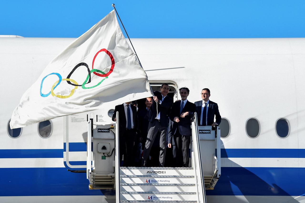 FILE PHOTO: Olympic flag lands in Italy for 2026 Winter Games