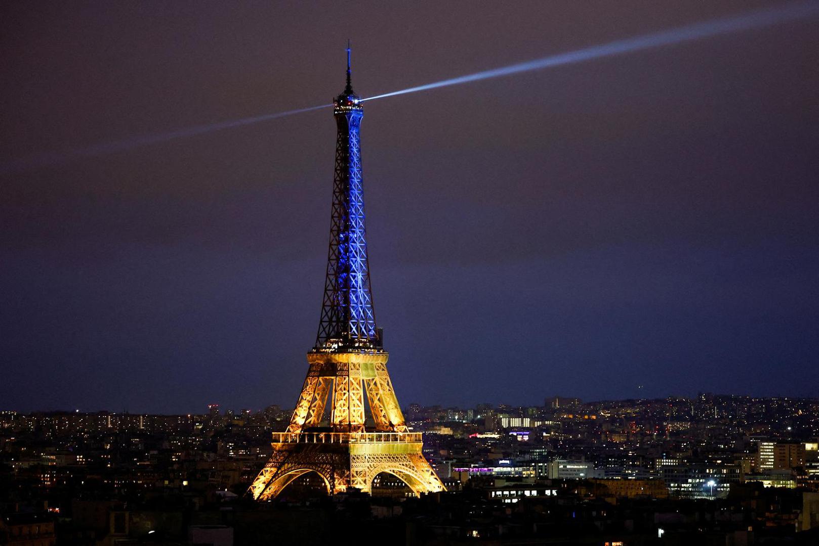 FILE PHOTO: The Eiffel Tower is lit up in the national blue-and-yellow colours of Ukraine, to mark the first anniversary of Russia's invasion of Ukraine, in Paris, France, February 23, 2023. REUTERS/Sarah Meyssonnier/File Photo Photo: Sarah Meyssonnier/REUTERS