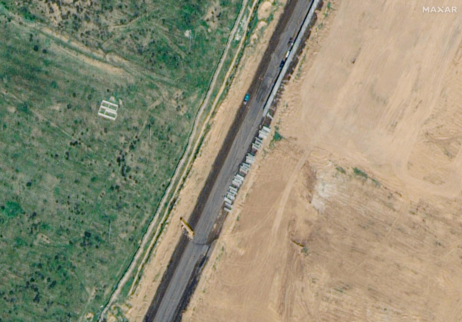 A satellite image shows the construction of a wall along the Egypt-Gaza border near Rafah, February 15, 2024. Maxar Technologies/Handout via REUTERS    THIS IMAGE HAS BEEN SUPPLIED BY A THIRD PARTY. NO RESALES. NO ARCHIVES. MANDATORY CREDIT. DO NOT OBSCURE LOGO. Photo: MAXAR TECHNOLOGIES/REUTERS