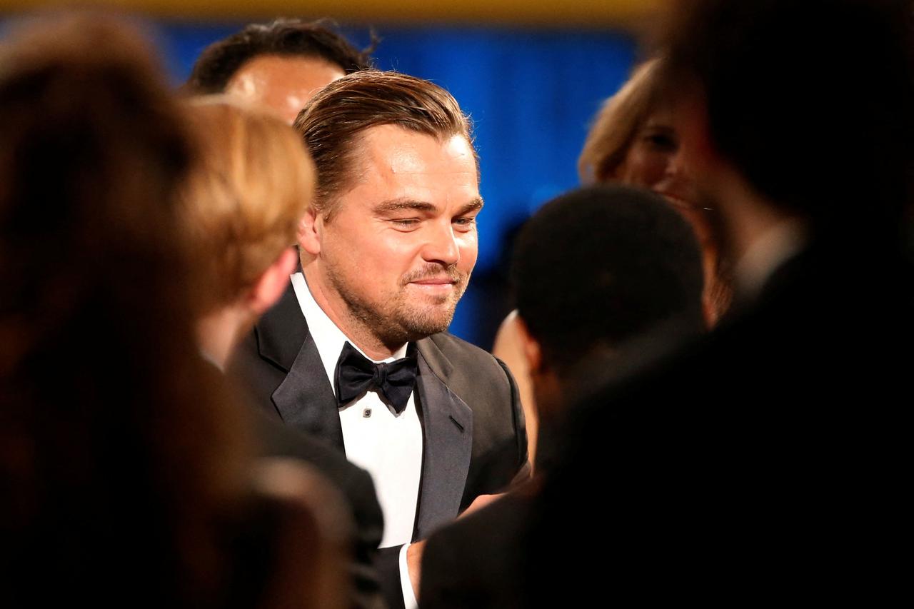 FILE PHOTO: Leonardo DiCaprio takes the stage to accept the award for Outstanding Performance by a Male Actor in a Leading Role for his role in "The Revenant" at the 22nd Screen Actors Guild Awards in Los Angeles