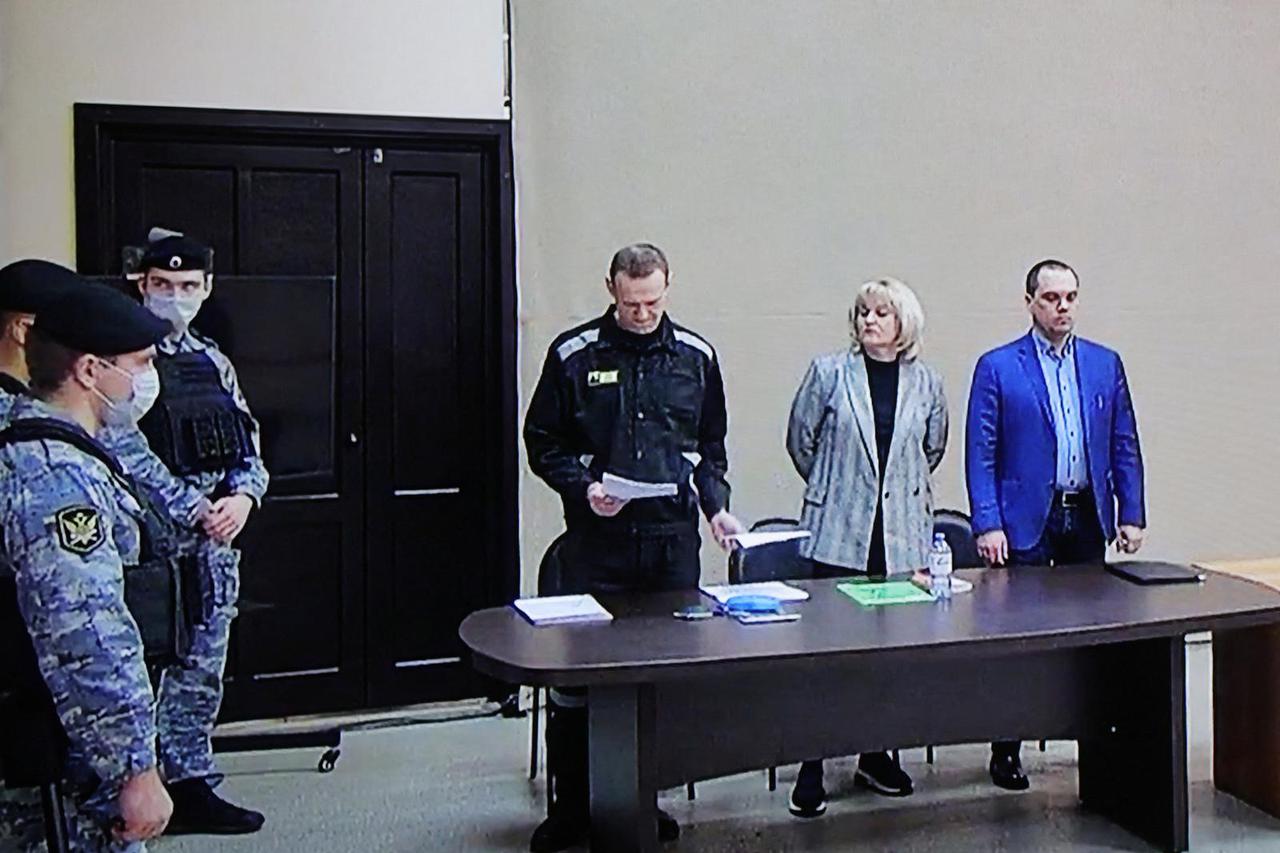 Jailed Russian opposition leader Alexei Navalny attends a court hearing in Pokrov