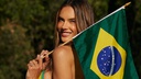 PHOTO: Wow, what a butt! Model (45) set the internet ablaze supporting Brazil in a tiny bikini