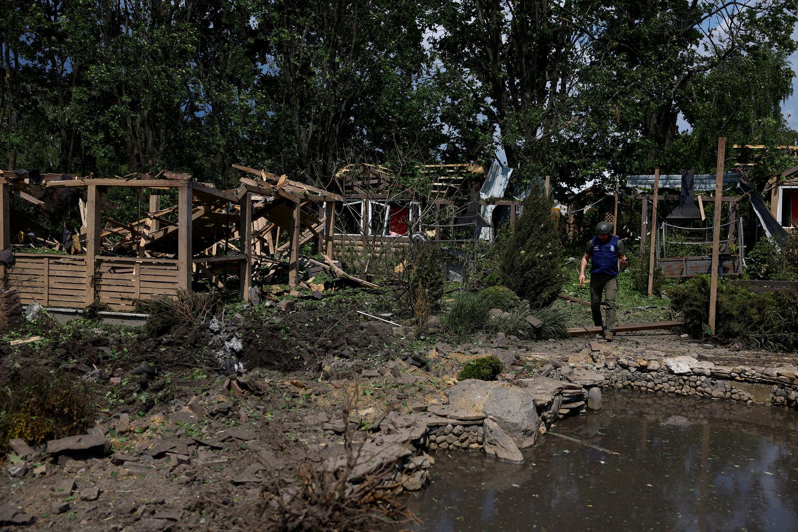 A war crimes prosecutor inspects a resort compound hit by a Russian missile strike in Kharkiv, amid Russia's attack on Ukraine May 19, 2024. REUTERS/Valentyn Ogirenko Photo: VALENTYN OGIRENKO/REUTERS