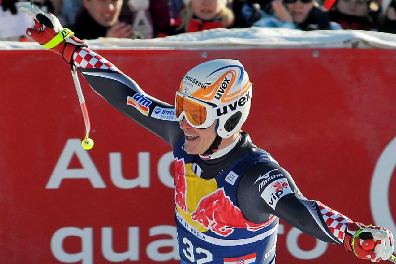 'Ivica Kostelic of Croatia reacts in the finish area to finish 7th after the men\'s downhill race during FIS ski World cup on January 23, 2010 in Kitzbuehel. AFP PHOTO / SAMUEL KUBANI'