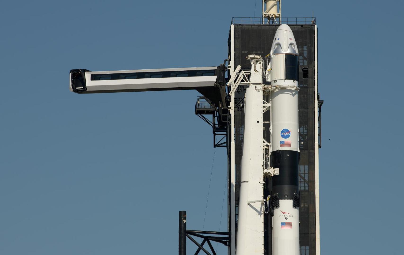 FILE PHOTO: The crew access arm is swung into position to a SpaceX Falcon 9 rocket with the company's Crew Dragon spacecraft onboard FILE PHOTO: The crew access arm is swung into position to a SpaceX Falcon 9 rocket with the company's Crew Dragon spacecraft onboard on the launch pad at Launch Complex 39A at NASA’s Kennedy Space Center as preparations continue for the Demo-2 mission to the International Space Station, in Cape Canaveral, Florida, U.S. May 21, 2020.  NASA/Bill Ingalls/Handout via REUTERS.  THIS IMAGE HAS BEEN SUPPLIED BY A THIRD PARTY. MANDATORY CREDIT/File Photo NASA NASA