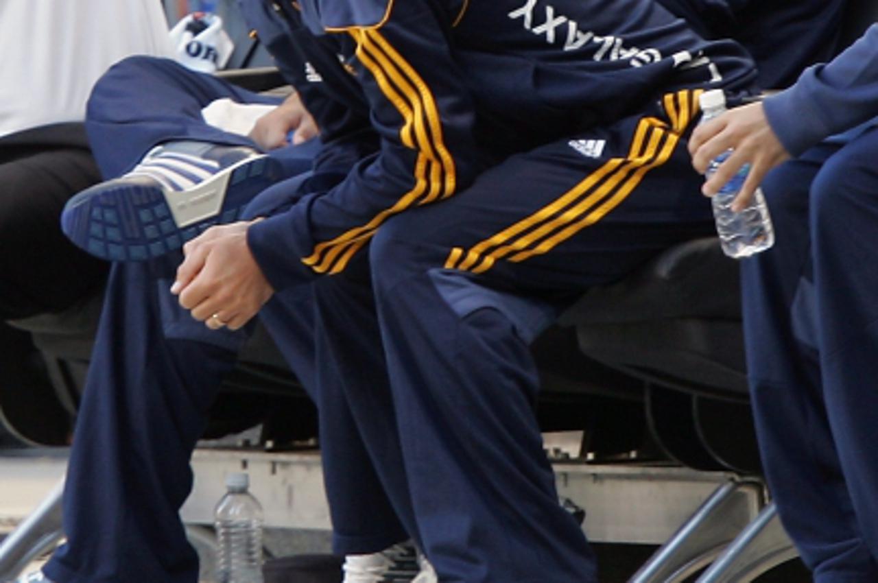 'David Beckham of LA Galaxy looks on from the bench during their match against the New York Red Bulls at Red Bull Arena in Harrison, New Jersey. Galaxy defeated the Red Bulls 1-0. Photo: Press Associa