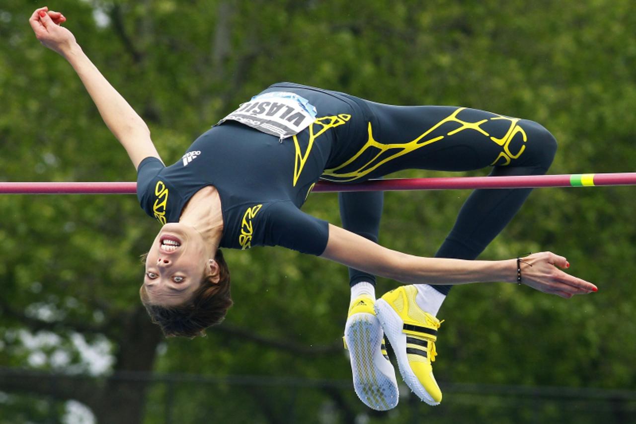 'Blanka Vlasic of Croatia clears the bar at 1.94 meters to win the women's high jump at the Diamond League Adidas Grand Prix in New York, May 25, 2013. REUTERS/Gary Hershorn (UNITED STATES - Tags: SP