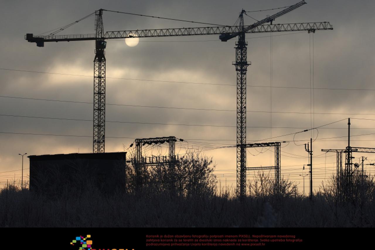 '21.12.2011., Zagreb - Na prvi dan zime sunce se jedva probija kroz maglu i oblake nad zagrebackim naseljem Buzin. Photo: Davor Puklavec/PIXSELL'