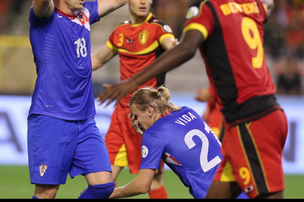 '11.09.2012., stadion Kralj Baudouin, Bruxelles, Belgija - Kvalifikacije za Svjetsko nogometno prvenstvo 2014., skupina A, 2. kolo, Belgija - Hrvatska. Ivica Olic i Domagoj Vida.  Photo: Marko Prpic/P