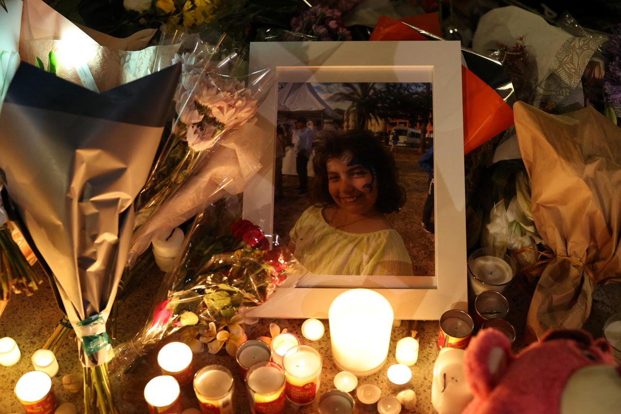 A photograph of Matilda Britvan, 10, a victim of a shooting at Jewish holiday celebration on Sunday at Bondi Beach, lies amongst floral tributes in Sydney