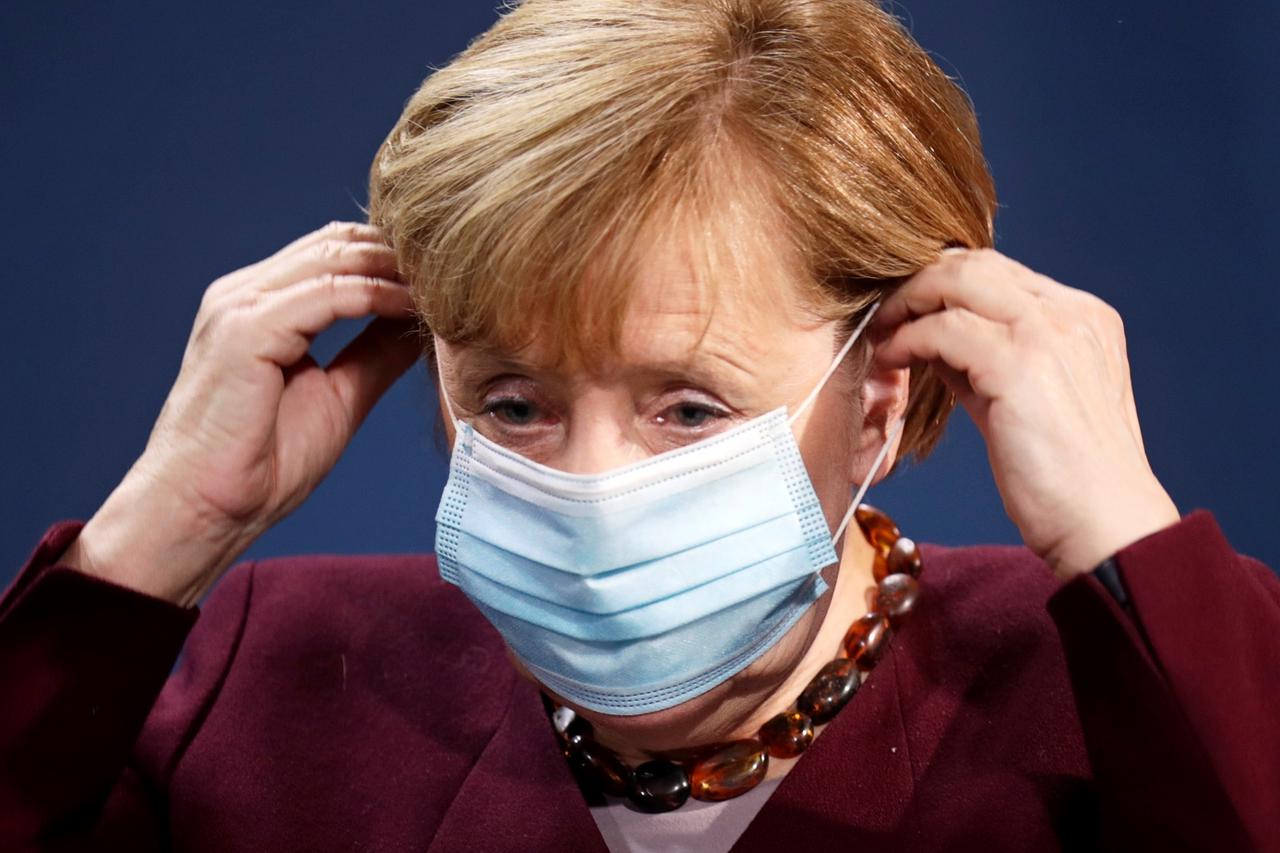 German Chancellor Merkel and FM Scholz hold news conference in Berlin