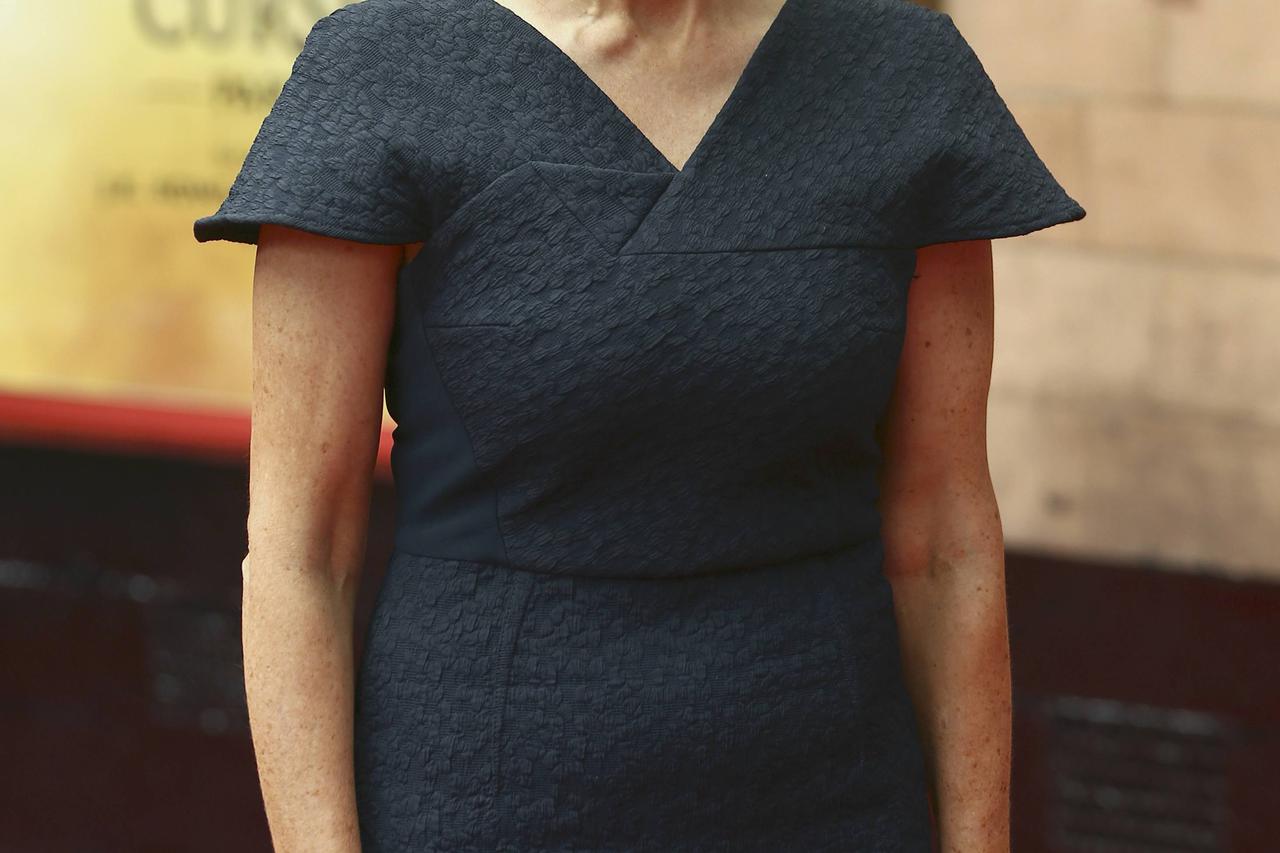 Author J.K. Rowling poses for photographers at a gala performance of the play Harry Potter and the Cursed Child parts One and Two, in London, Britain July 30, 2016. REUTERS/Neil Hall