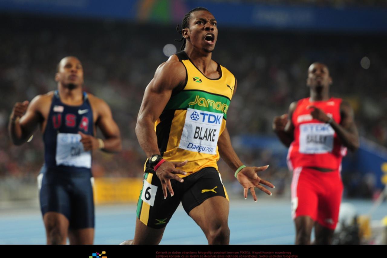 'Jamaica\'s Yohan Blake celebrates winning the Men\'s 100m Final Photo: Press Association/Pixsell'