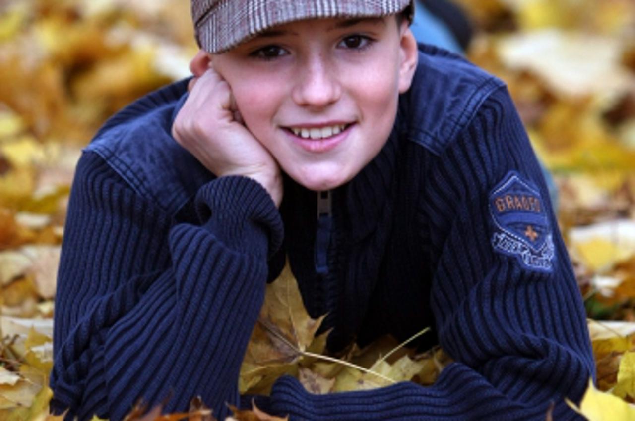 '17.10.2012., Zagreb - Mile Bljanovic, mali glumac koji igra Segrta Hlapica, sa svojom obitelji.  Photo: Goran Jakus/PIXSELL'