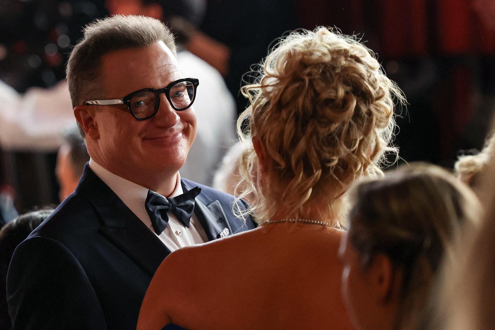 Brendan Fraser poses on the champagne-colored red carpet during the Oscars arrivals at the 95th Academy Awards in Hollywood, Los Angeles, California, U.S., March 12, 2023. REUTERS/Mario Anzuoni Photo: MARIO ANZUONI/REUTERS