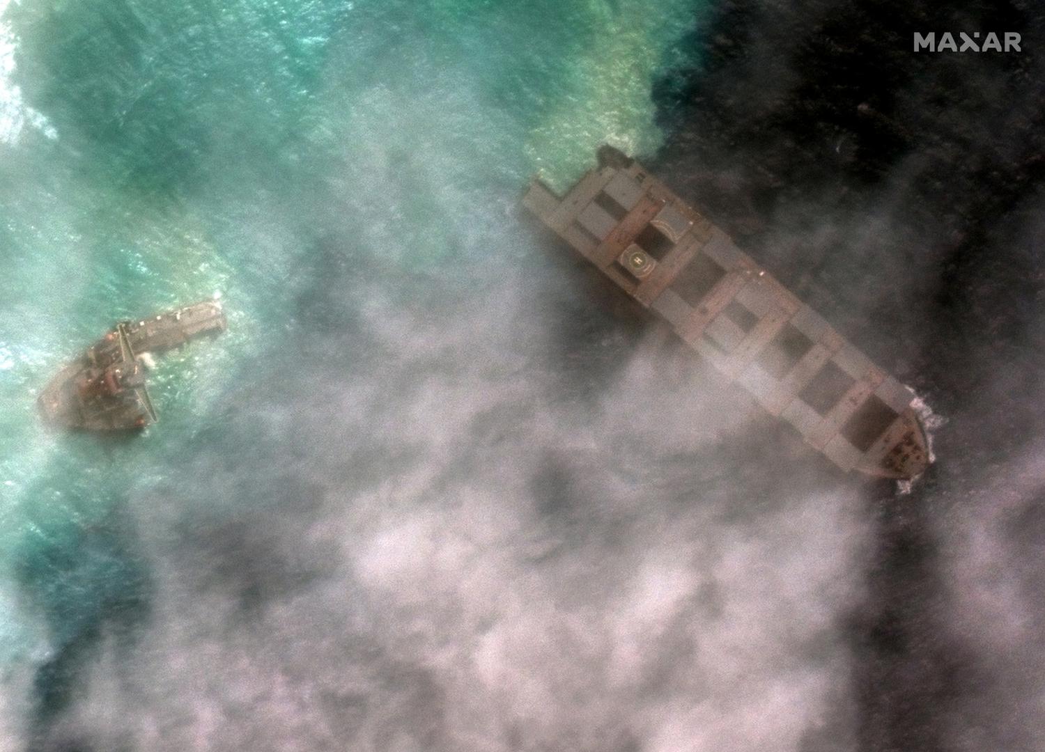 Satellite image shows Japanese bulk carrier ship MV Wakashio A satellite image shows the broken-up Japanese bulk carrier ship MV Wakashio, that ran aground on a reef last month causing an oil spill, off the coast of Pointe d'Esny, Mauritius August 15, 2020. Image taken August 15, 2020. Satellite image ©2020 Maxar Technologies/Handout via REUTERS  THIS IMAGE HAS BEEN SUPPLIED BY A THIRD PARTY. MANDATORY CREDIT. MUST NOT OBSCURE WATERMARK. NO RESALES. NO ARCHIVES MAXAR TECHNOLOGIES