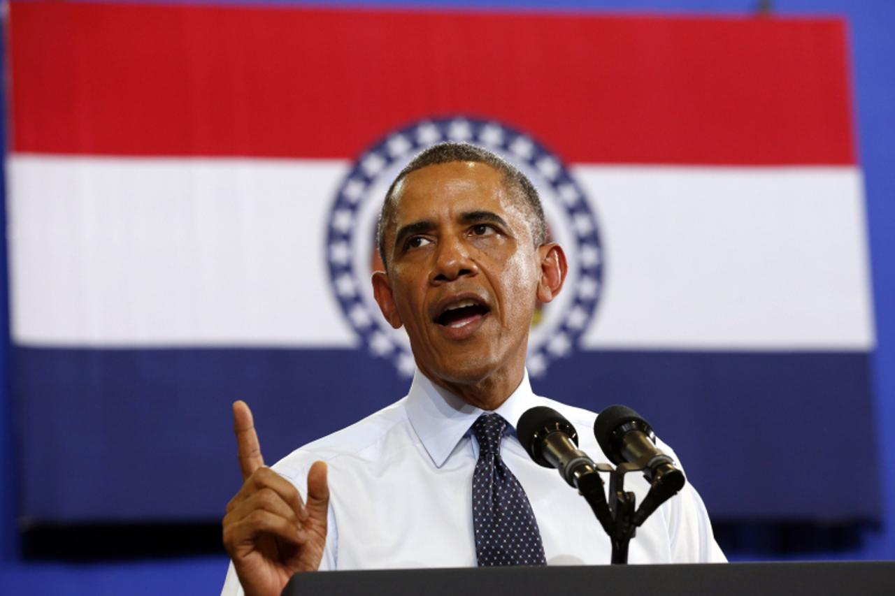 'U.S. President Barack Obama speaks about the economy during a trip to the University of Central Missouri in Warrenburg, Missouri July 24, 2013   REUTERS/Kevin Lamarque   (UNITED STATES - Tags: POLITI