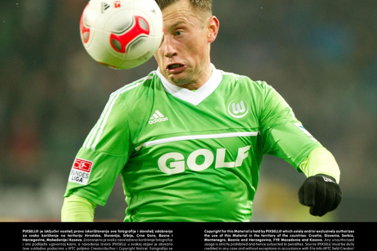 'Wolfsburg's Ivica Olic plays the ball during the German Bundesliga soccer match between VfL Wolfsburg and Bayern Munich, at the Volkswagen Arena in Wolfsburg, Germany, 15 February 2013. Photo: Sebas
