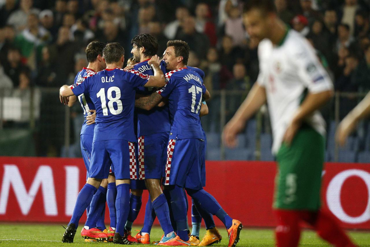 Croatia's players celebrate after Nikolay Bodurov of Bulgaria scored an own goal during their Euro 2016 Group H qualifying soccer match at Vassil Levski stadium in Sofia October 10, 2014.      REUTERS/Stoyan Nenov (BULGARIA - Tags: SPORT SOCCER)